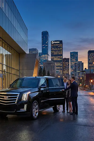 Luxury wedding limousine service at Edmonton hotel entrance